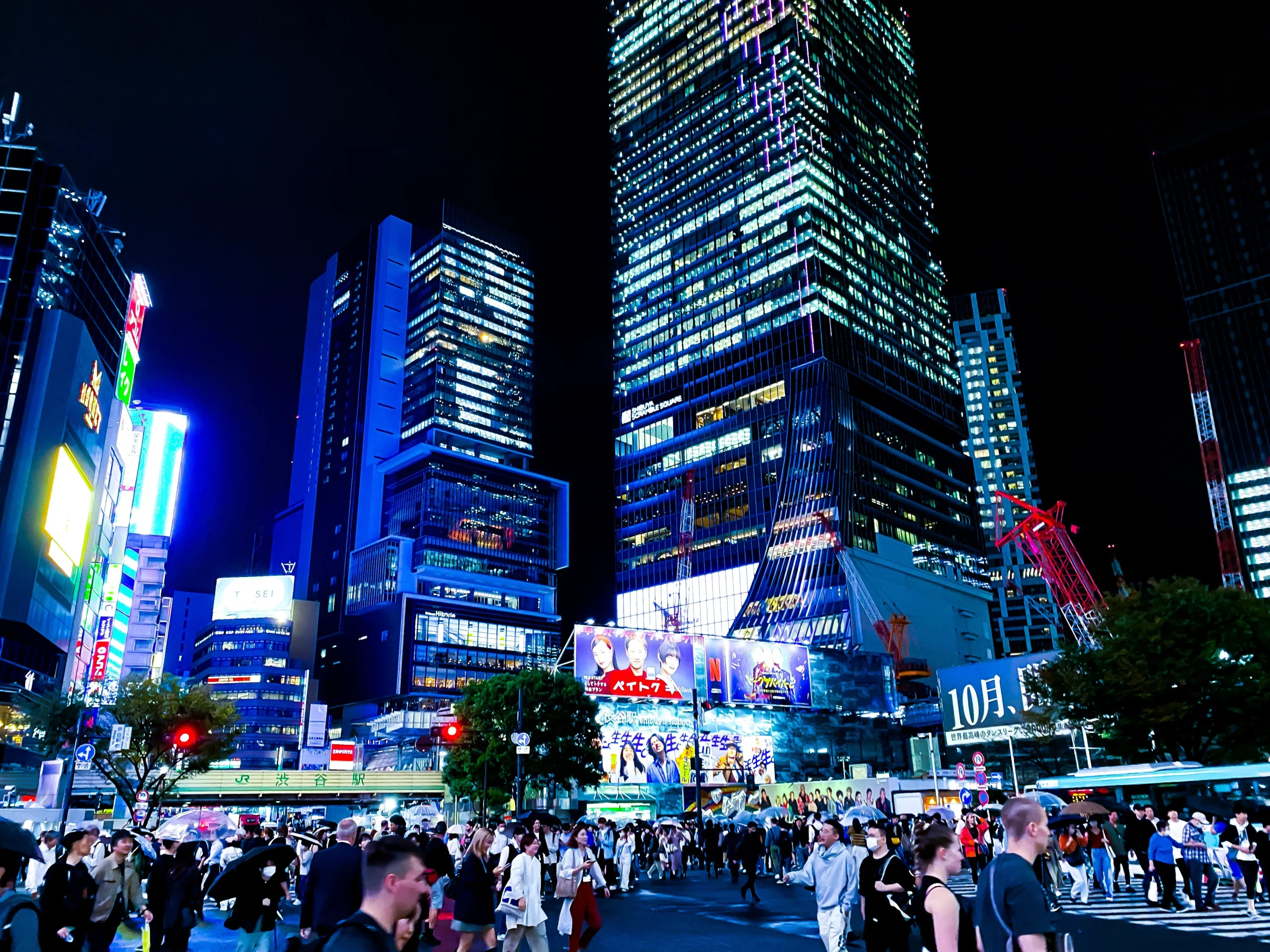 Shibuya Scramble Crossing on a Rainy Night is a Cyberpunk